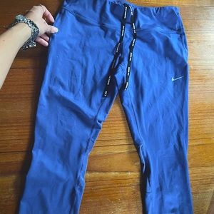 Nike running women mesh paneled mid-rise legging